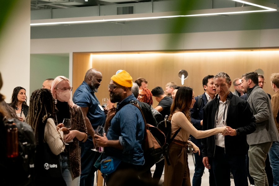 Conference attendees networking at Moscone Center